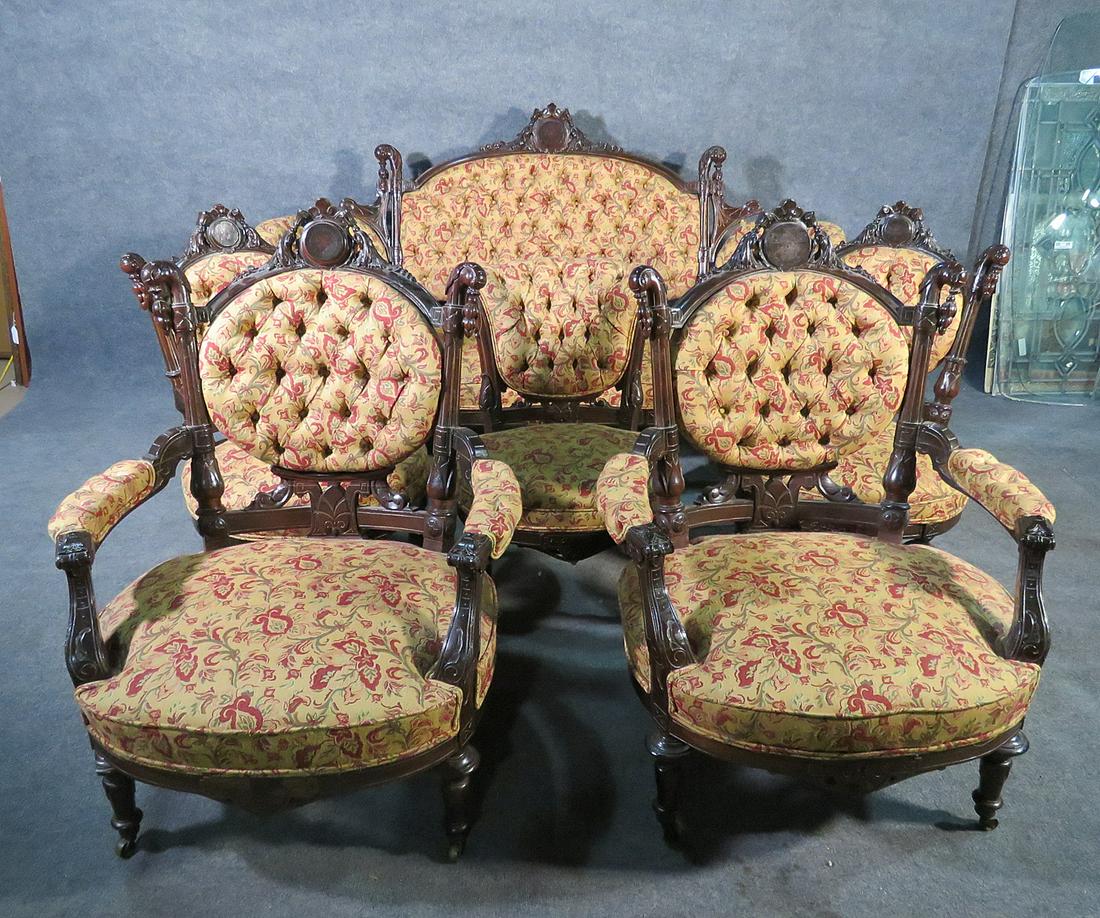 POTTIER & STYMUS 6 PC RENAISSANCE PARLOR SET: Tufted. Inlaid. Carved. Upholstered. 6 pieces. Sofa measures 42 5/8" h x 72" w x 32" d. Seat height 17". 3 side chairs. 2 measure 36" h x 22" w x 24" d. Seat height 16". Other side chair measures 30" 