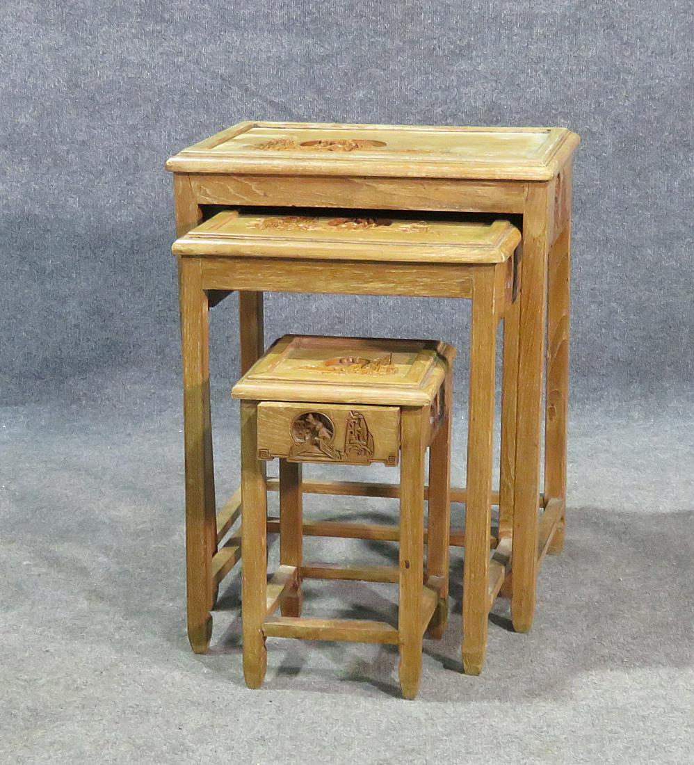 3 ASIAN CARVED STACKING TABLES: Carved. Wood. One drawer on small table. Measures 25 1/4" h x 20 1/8" w x 13 7/8" d. Other measures 22 1/4" h x 16 1/2" w x 12 1/2" d. Smallest measures 16 1/4" h x 9 5/8" w x 9 1/2" d.