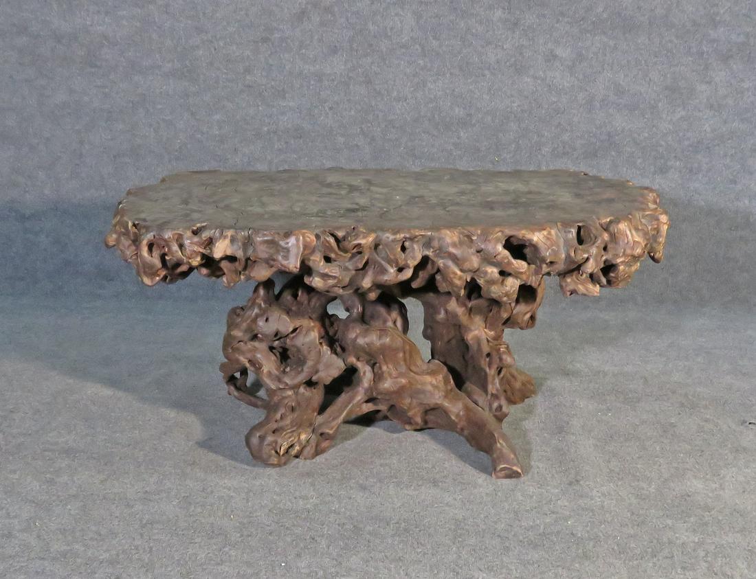 ROOT WOOD COFFEE TABLE: Wood. Carved. 20 5/8" h x 47 3/4" w x 26 1/4" d.