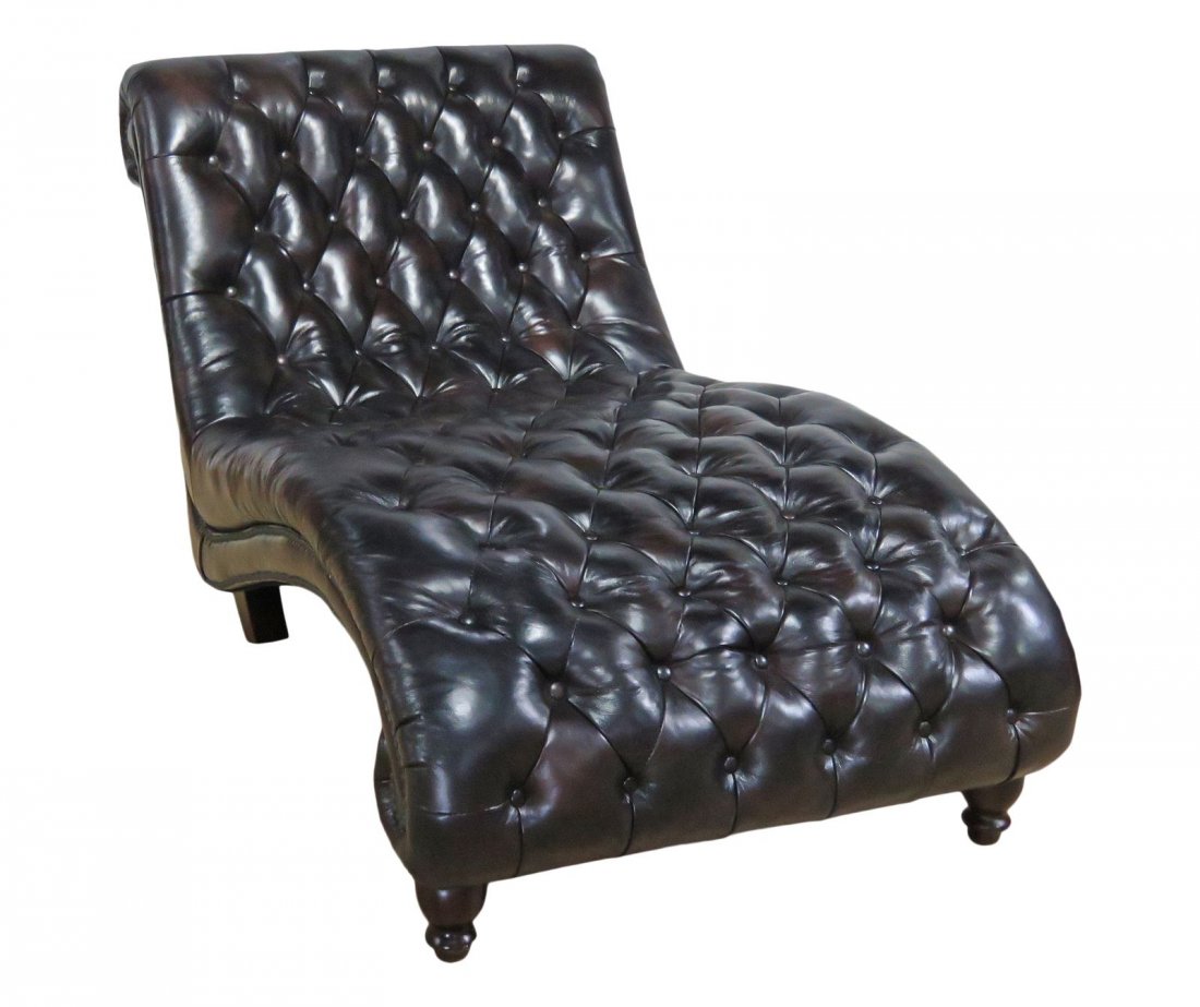 CHESTERFIELD LOUNGE CHAIR: Leather upholstery. Nail head trim. Wood feet. 39 1/4" h x 37" w x 69 1/2" d. Seat height 20 1/2".