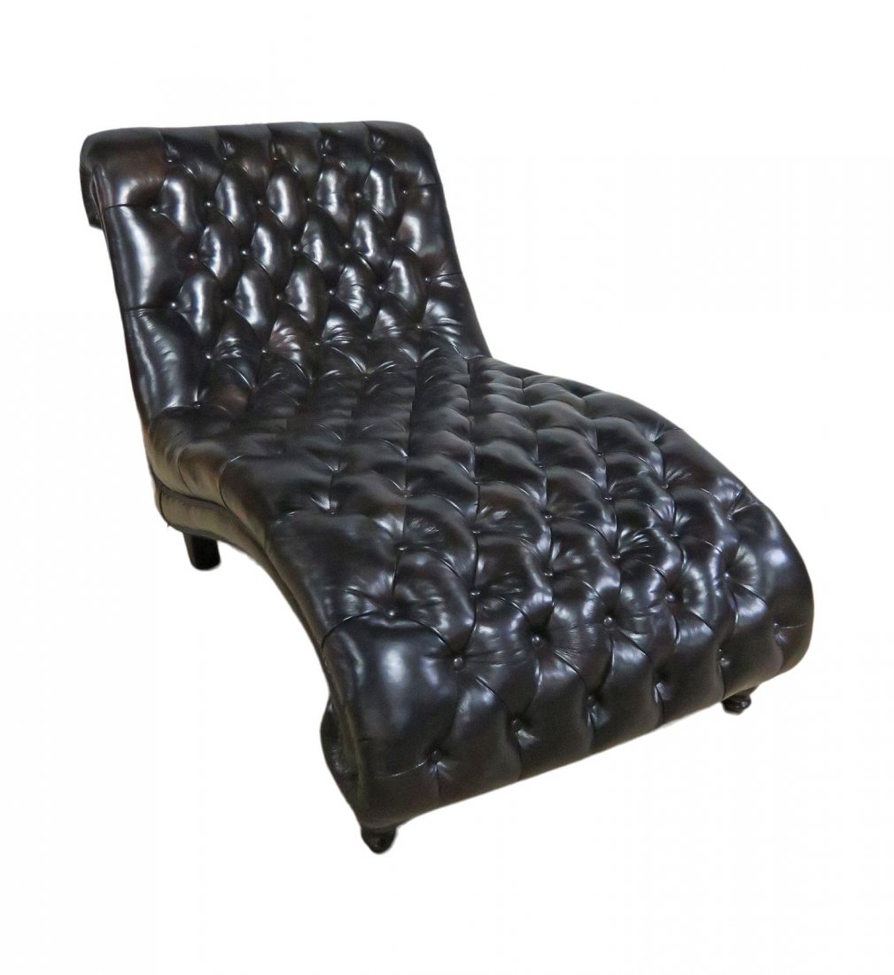 CHESTERFIELD LOUNGE CHAIR: Leather upholstery. Nail head trim. Wood feet. 39 1/4" h x 37" w x 69 1/2" d. Seat height 20 1/2".