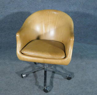 NICOS ZOGRAPHOS STYLE LEATHER ARM CHAIR: Chrome frame. Leather upholstery. On wheels. 32 3/4" h x 23" w x 26" d. Seat height 20".