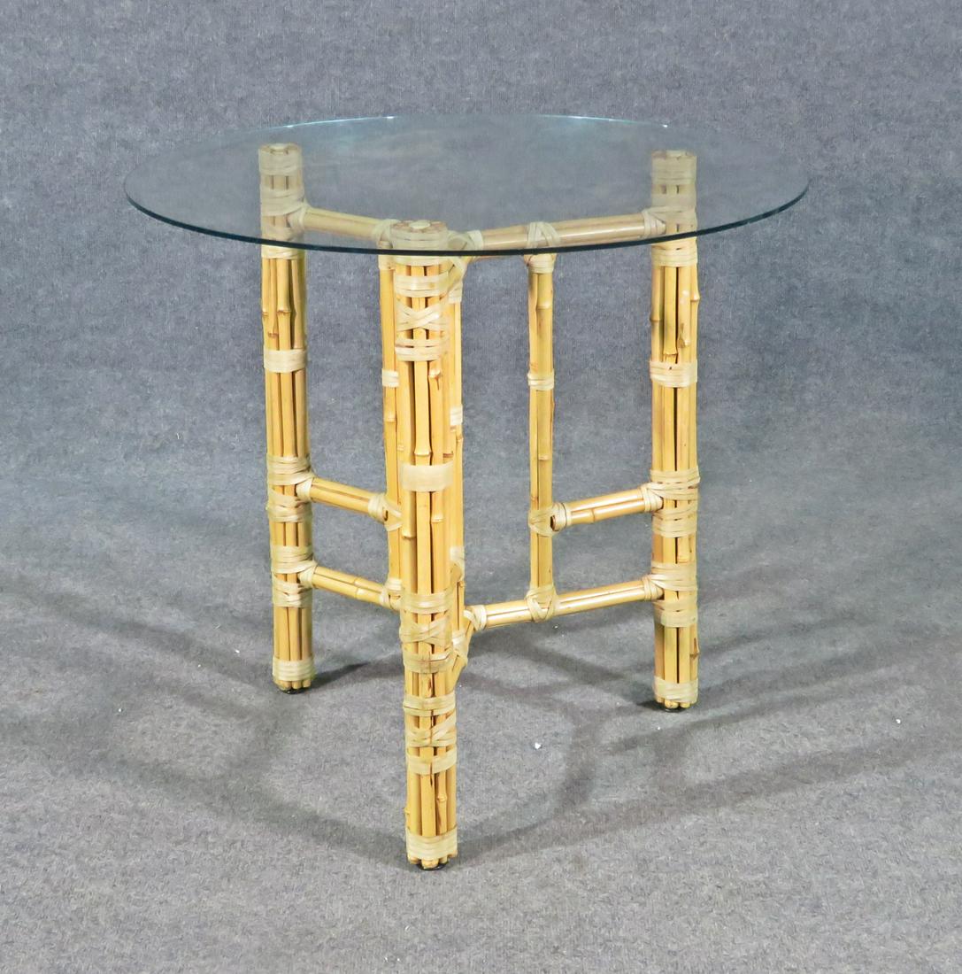 BAMBOO GLASS TOP TABLE: Bamboo base. 28 1/2" h x 30" diameter.