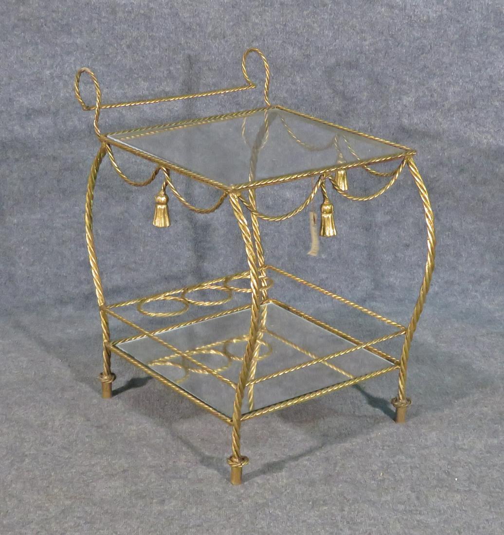 ITALIAN ROPE TWIST GILDED BAR CART: Gilded rope twist frame. Two tier. Glass top. Mirrored bottom. 26" h x 22 1/8" w x 16 1/8" d.