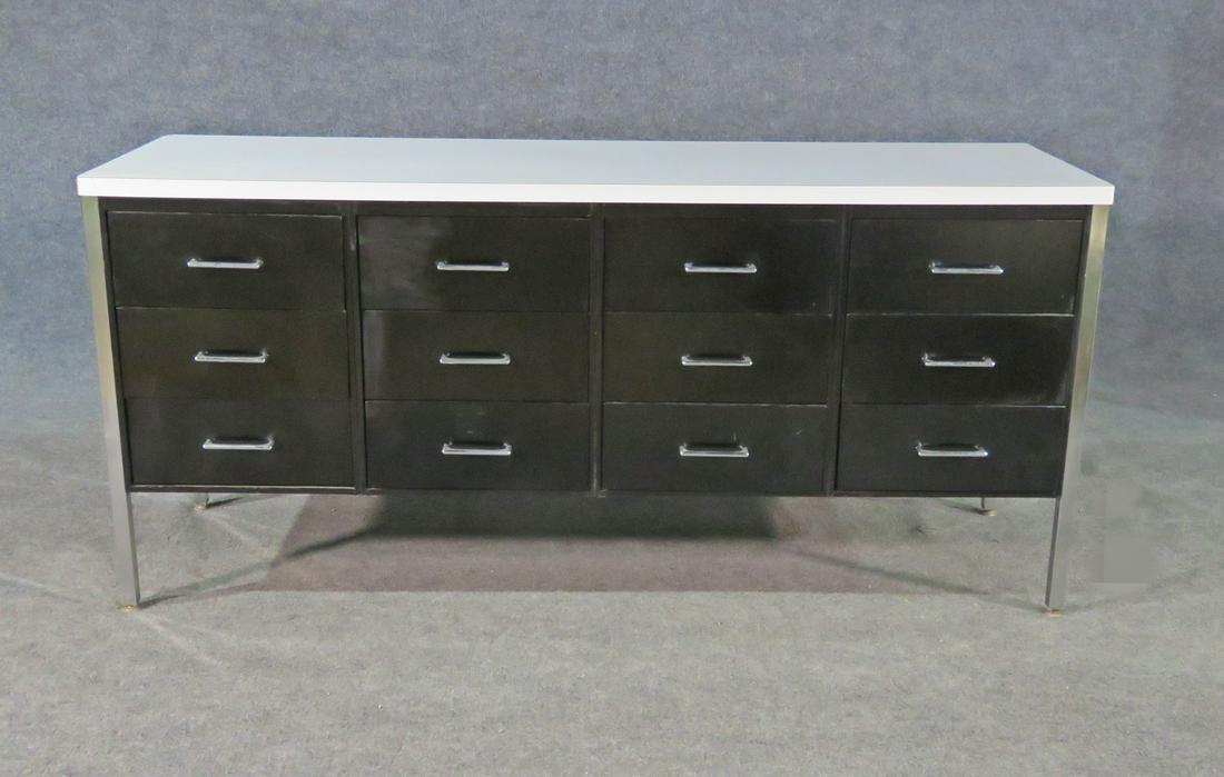 KNOLL STYLE INDUSTRIAL 12 DRAWER DRESSER: Metal frame, hardware and 12 drawers. Laminated top. 28 3/4" h x 62 1/2" w x 21" d.