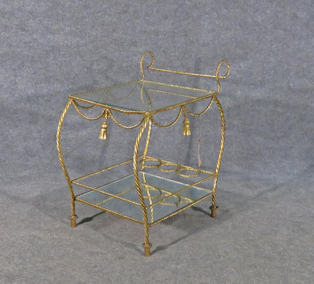 ITALIAN ROPE TWIST BAR CART: Gilded metal frame. One glass shelf. One mirrored shelf. 26 1/2" h x 18" w x 23" d.