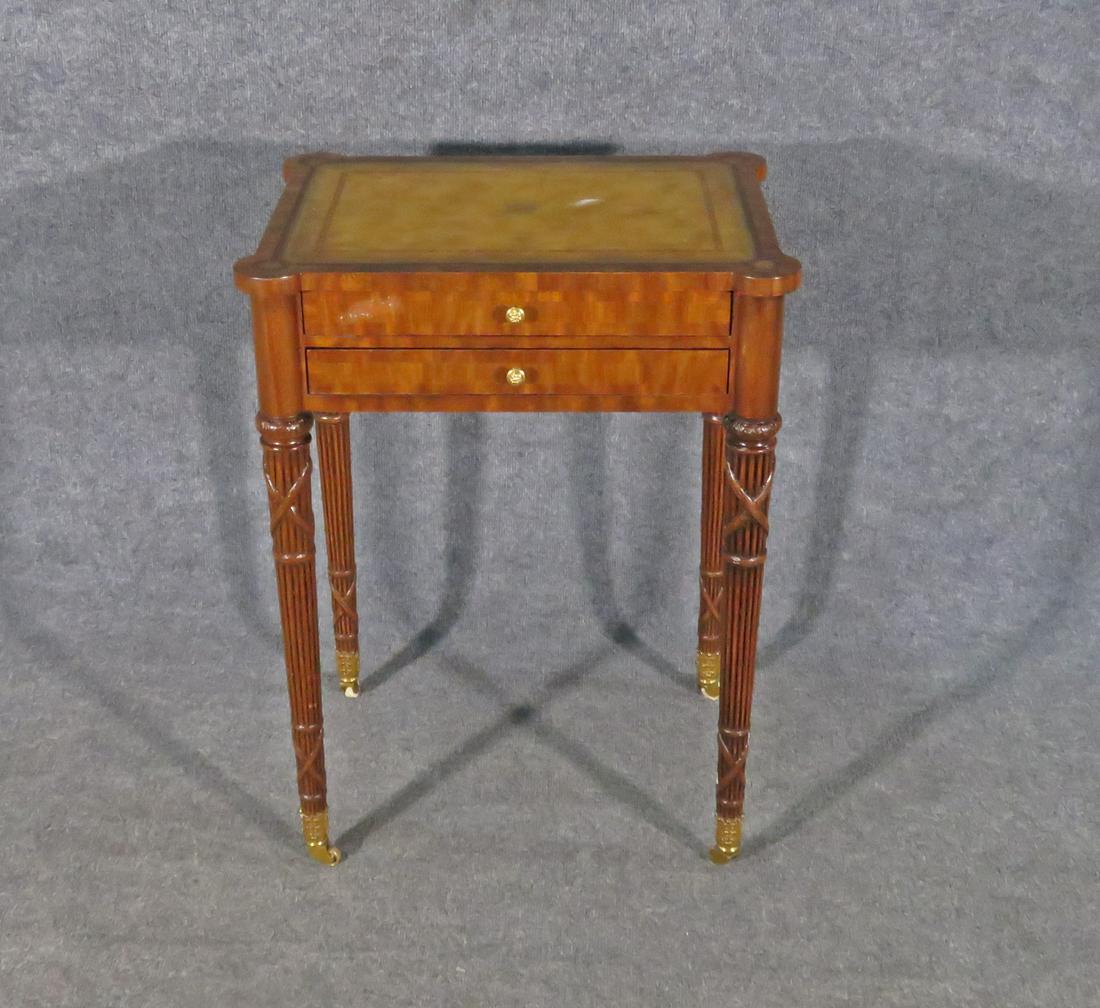 MAITLAND SMITH 2 DRAWER NIGHT STAND: Leather top. Two drawers. Metal hardware. On casters. 29 1/2" h x 22" w x 16 1/2" d.