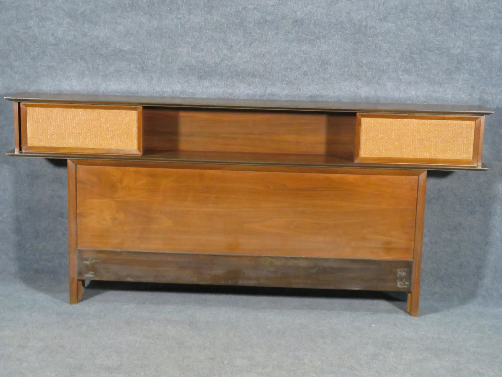 MID CENTURY MODERN HEADBOARD: Double bed. Two cane sliding doors. 37 1/2" h x 84" w x 10" d.