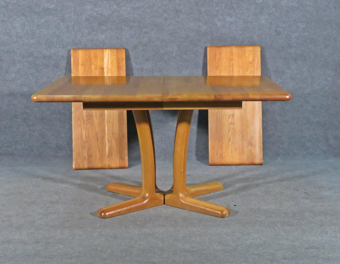 DRYLUND DANISH DINING TABLE: Maple. With 2 - 15 3/4" leaves. 28 1/4" h x 52 3/4" w (without leaves) x 35 3/8" d.