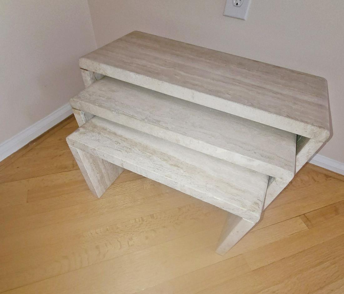 NEST OF 3 TRAVERTINE WATERFALL EDGE TABLES: Travertine. Waterfall edge. 14" h x 28 3/8" w x 11 3/4" d.