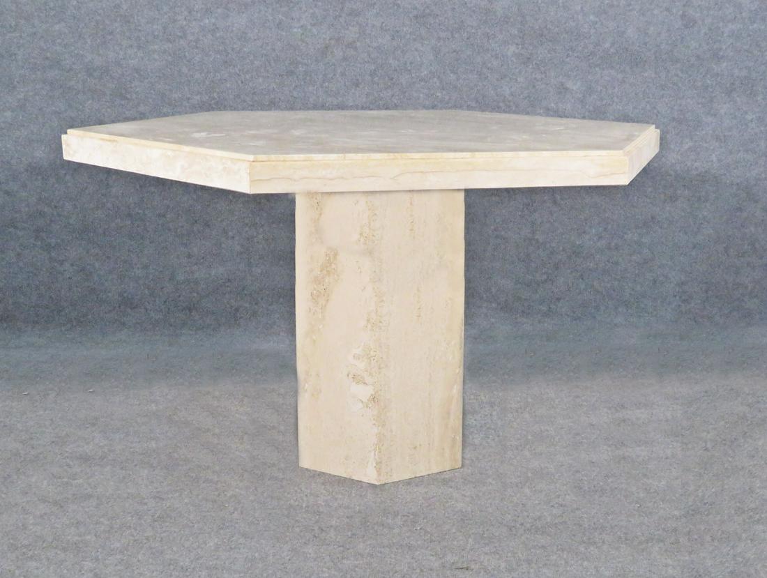 TRAVERTINE OCTOGANAL CENTER TABLE: All travertine. 28 1/4" h x 49 1/2" w x 43" d.