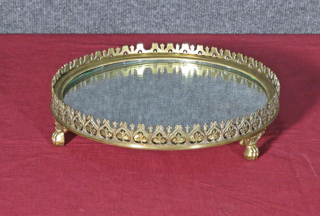 ANTIQUE BRONZE PLATEAU: Bronze frame. Footed. 2 1/4" h x 0 3/8" diameter.