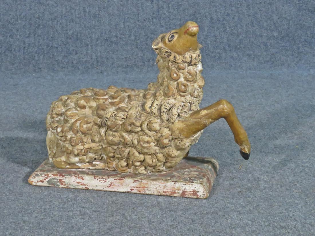 EARLY PRIMITIVE SHEEP: Wood. Painted. 11" h x 14 1/2" w x 5 7/8" d.