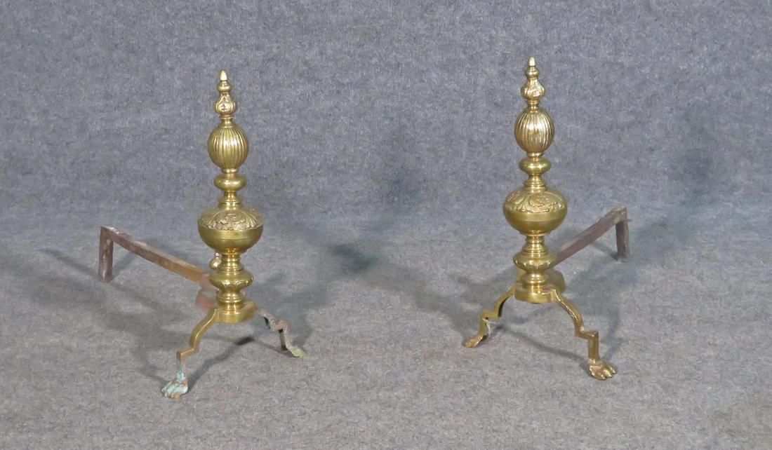 PAIR BRASS ANDIRONS: Brass. Claw feet. 20" h x 11" w x 21" d.
