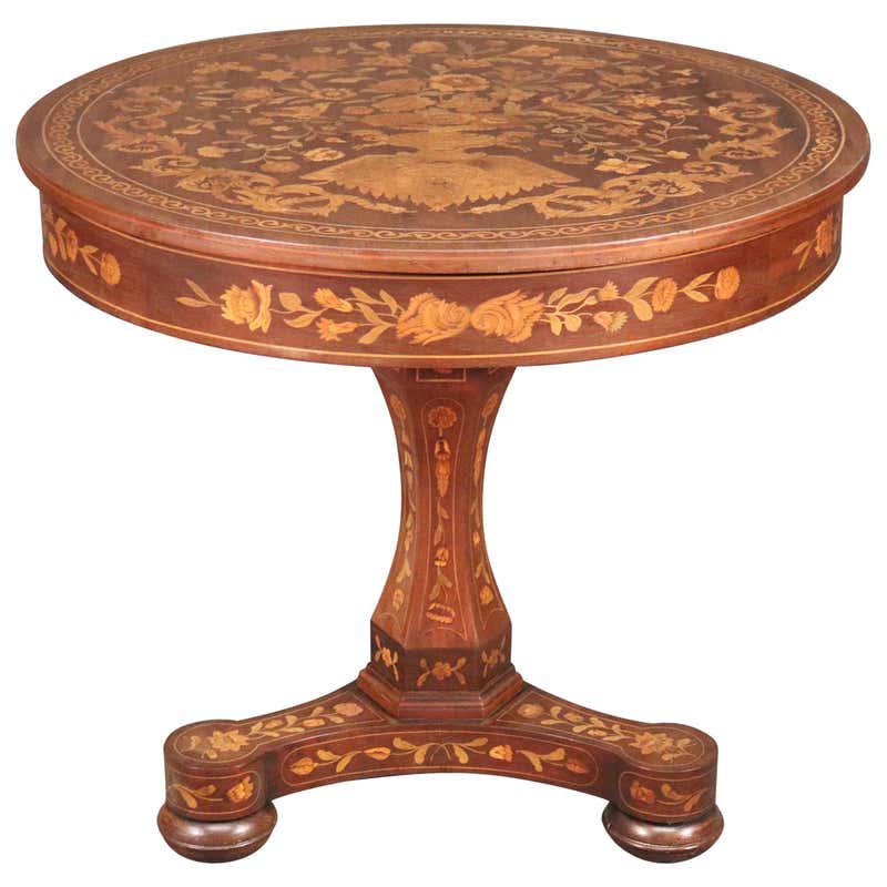 DUTCH MARQUETRY MAHOGANY & SATINWOOD CENTER TABLE: Stained tulip wood and satinwood inlay. Mahogany frame. 29" h x 33" w x 33" d.