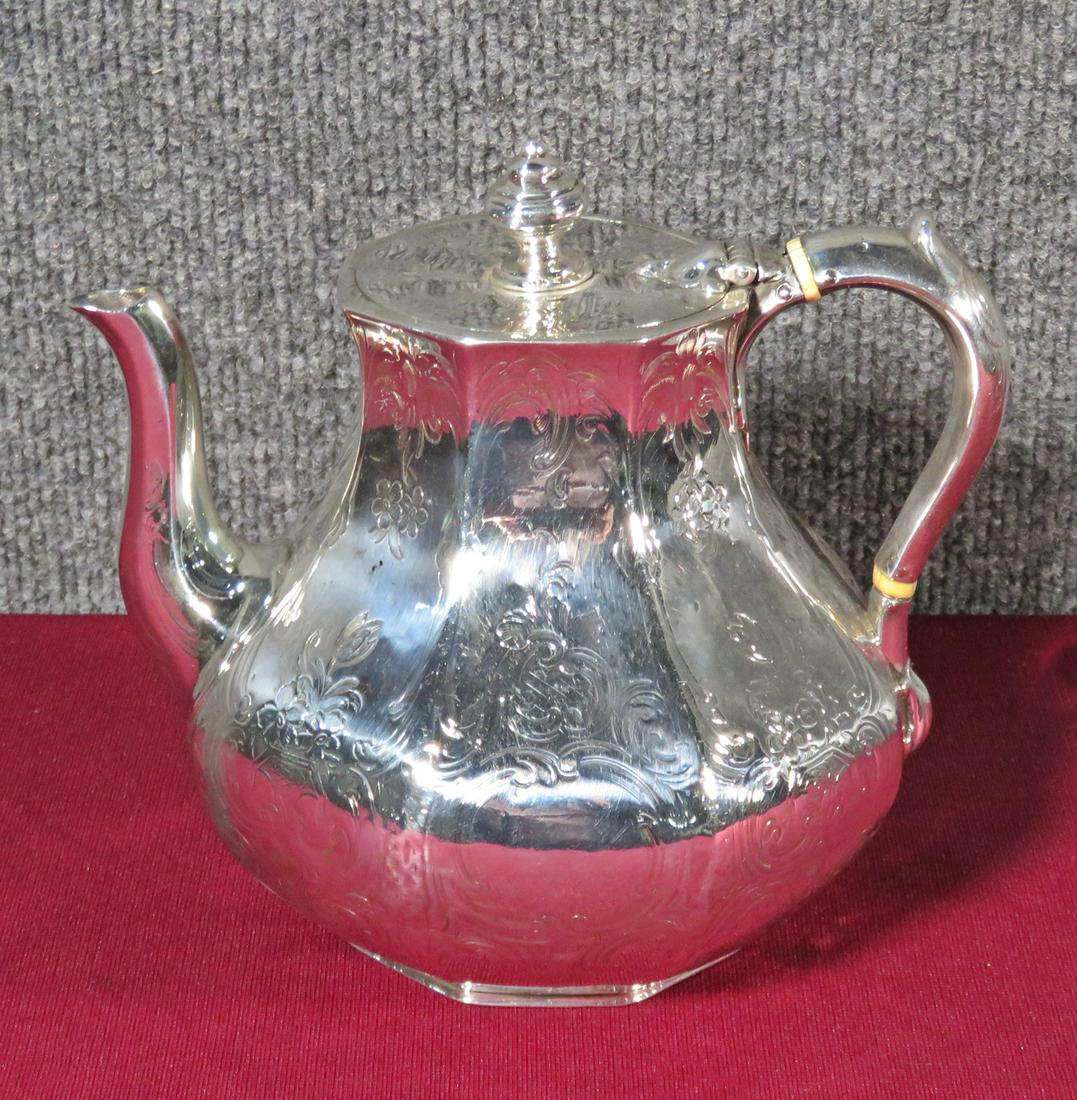 STERLING SILVER TEAPOT: English hallmarked. Makers mark CTF. GF. Approximately 17.3 troy ounces.