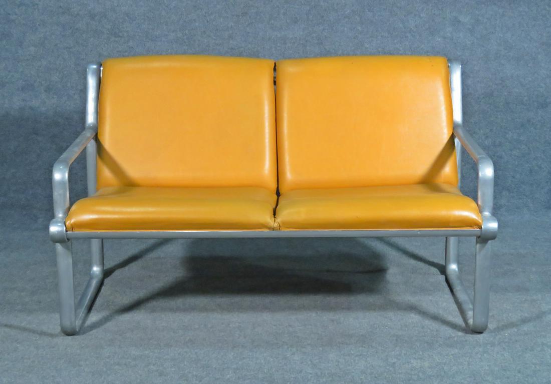 KNOLL STYLE ALUMINUM & LEATHER LOVE SEAT: Aluminum frame. Leather upholstery. 30" h x 47 3/4" w x 30 1/2" d. Seat height 16".