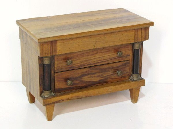 MINIATURE BIEDERMEIER STYLE CHEST: Ebonized columns. Bronze mounts. Very good condition. 10 3/4"h. x 14 3/8"w. x 7 3/8"d. Part of a collection from a prominent home in Sewell NJ.