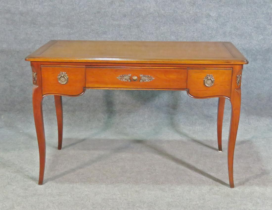 LOUIS XV STYLE LADIES DESK: 3 drawers. Metal accents. 30 1/8" h x 47" w x 24 1/8" d.