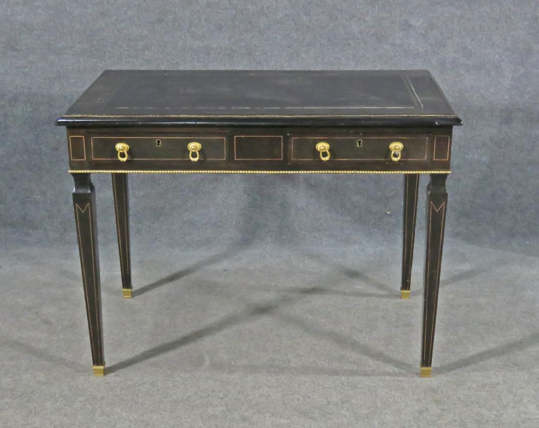 EBONIZED DIRECTOIRE DESK: Ebonized. Metal hardware and accents.2 dovetailed drawers. Painted accents. 27 5/8" h x 37 3/8" w x 22 7/8" d.