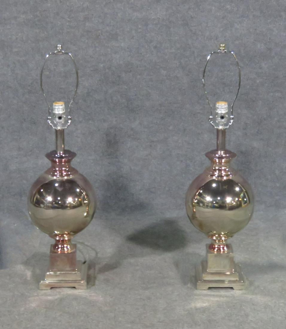 PAIR MID CENTURY MODERN LAMPS: Iridescent. 28" h x 8" diameter.
