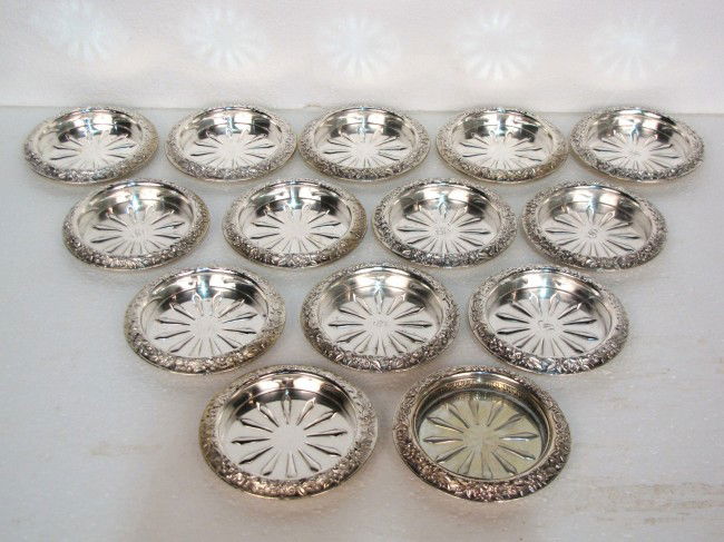 14 KIRK & SON STERLING SILVER REPOUSSE COASTERS: All sterling. Very good condition. 4 1/4" diameter. 25.4 troy oz.