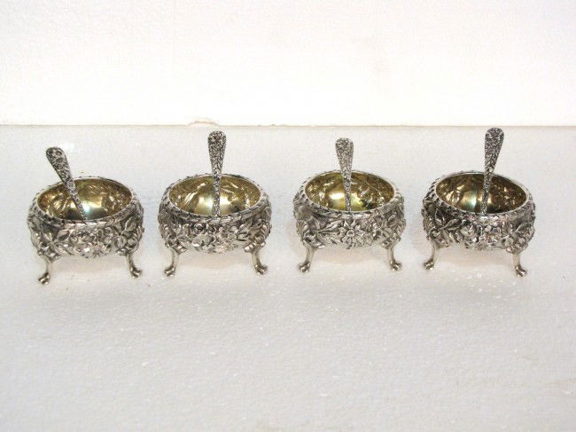 4 KIRK & SON STERLING SILVER REPOUSSE SALT CELLARS: With spoons. Very good condition. All 4 monogrammed on bottom. 10.2 troy oz.