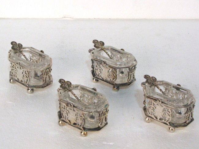 4 ANTIQUE 19th c. SILVERPLATE SALT CELLARS & SPOON: Good condition. One damaged glass insert. 1 1/2"h. x 3"w. x 2"d.