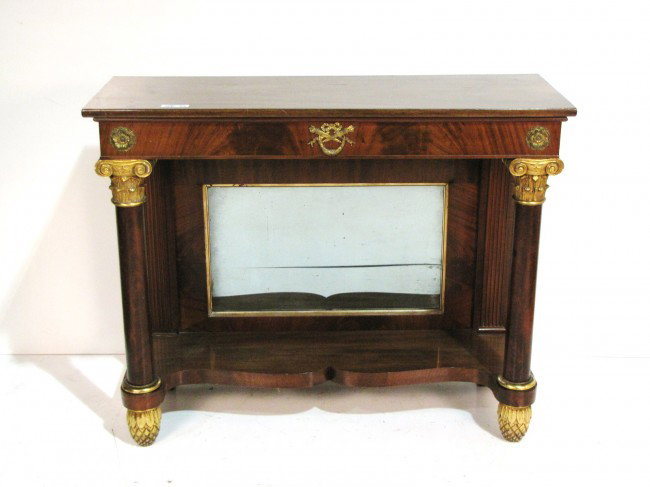 19th c. EMPIRE MAHOGANY & GILT PIER TABLE: Gilt carved feet and capitals. Very good condition. 38"h. x 47 1/2"w. x 17 1/4"d. From the estate of former Ambassador to Argentina James Bruce.