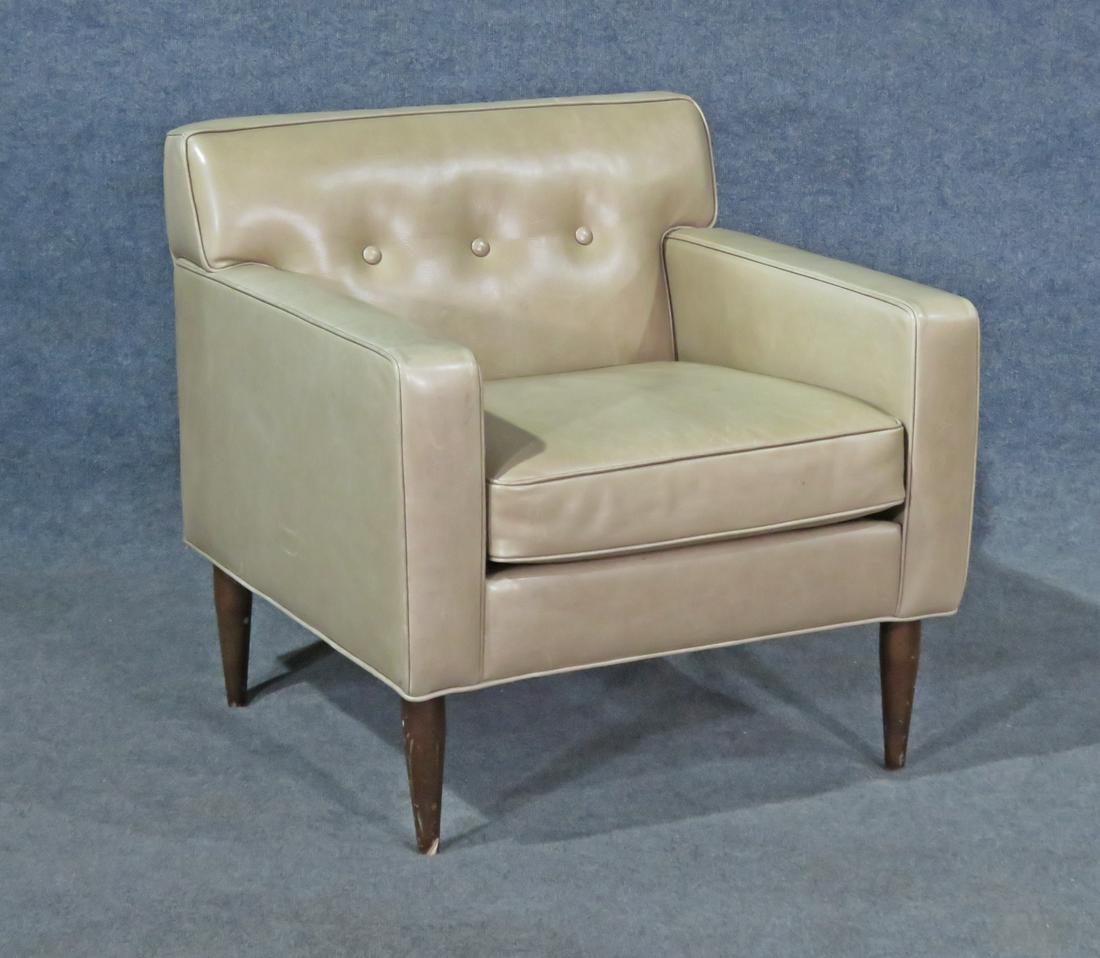 AMERICAN LEATHER INC ARM CHAIR: Leather upholstery. Wood legs. 30 1/2" h x 29" w x 29 5/8" d. Seat height 18 1/4".