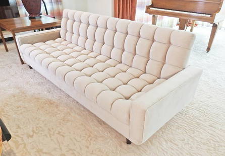 THE WILLIAM "BILLY" HAINES DESIGNS SOFA: Signed. Known as "Billie Haines". Beige velvet with cut velvet pillows. Tufted. 32" h x 96" w x 35" d. Seat height 16".