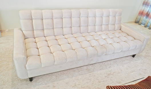 THE WILLIAM "BILLY" HAINES DESIGNS SOFA: Signed. Known as "Billie Haines". Beige velvet with cut velvet pillows. Tufted. 32" h x 96" w x 35" d. Seat height 16".