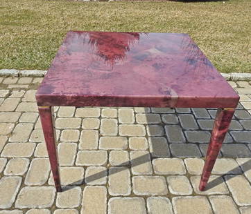 ENRIQUE GARCEL TABLE: Goat skin. Dye and lacquer finish. 28" h x 38" square.