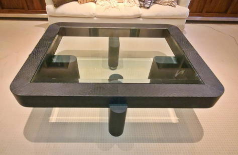 KARL SPRINGER CUSTOM COFFEE TABLE: Beveled glass insert top. Natural hide wrapping. Chrome clad legs. Unsigned. 18" h x 66 1/2" w x 54" d.