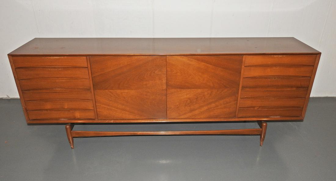 ARNE VODDER STYLE WALNUT CABINET: Walnut. Circa 1960's. 4 dovetailed drawers on each side. 34" h x 90" w x 19" d.