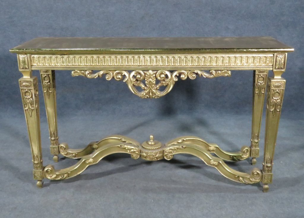 CARVED GILT FRENCH CONSOLE: Carved wood. Gold leaf. 32" h x 54 3/4" w x 16 3/8" d.
