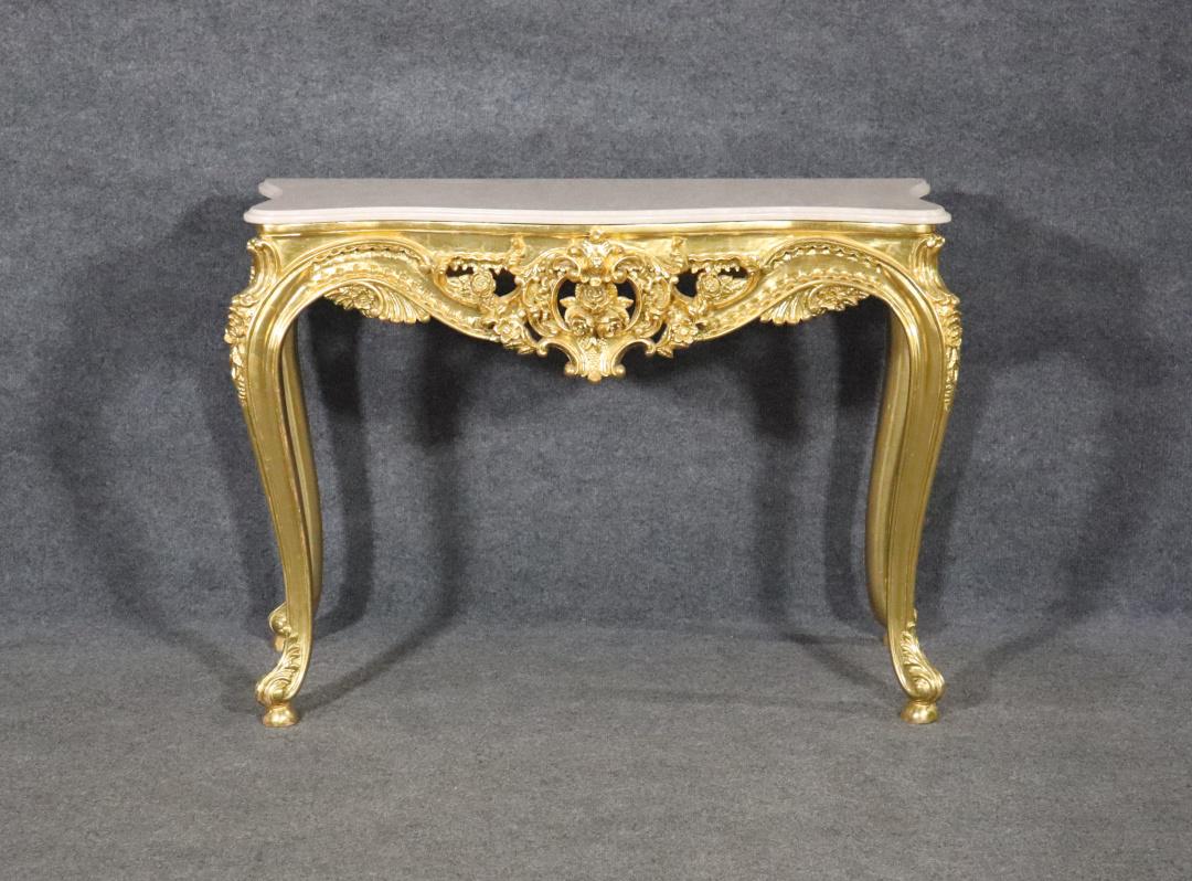 LOUIS XV STYLE MARBLE TOP CONSOLE: Carved gilt frame. Marble top. 31 1/4" h x 42 1/8" w x 16 1/2" d.