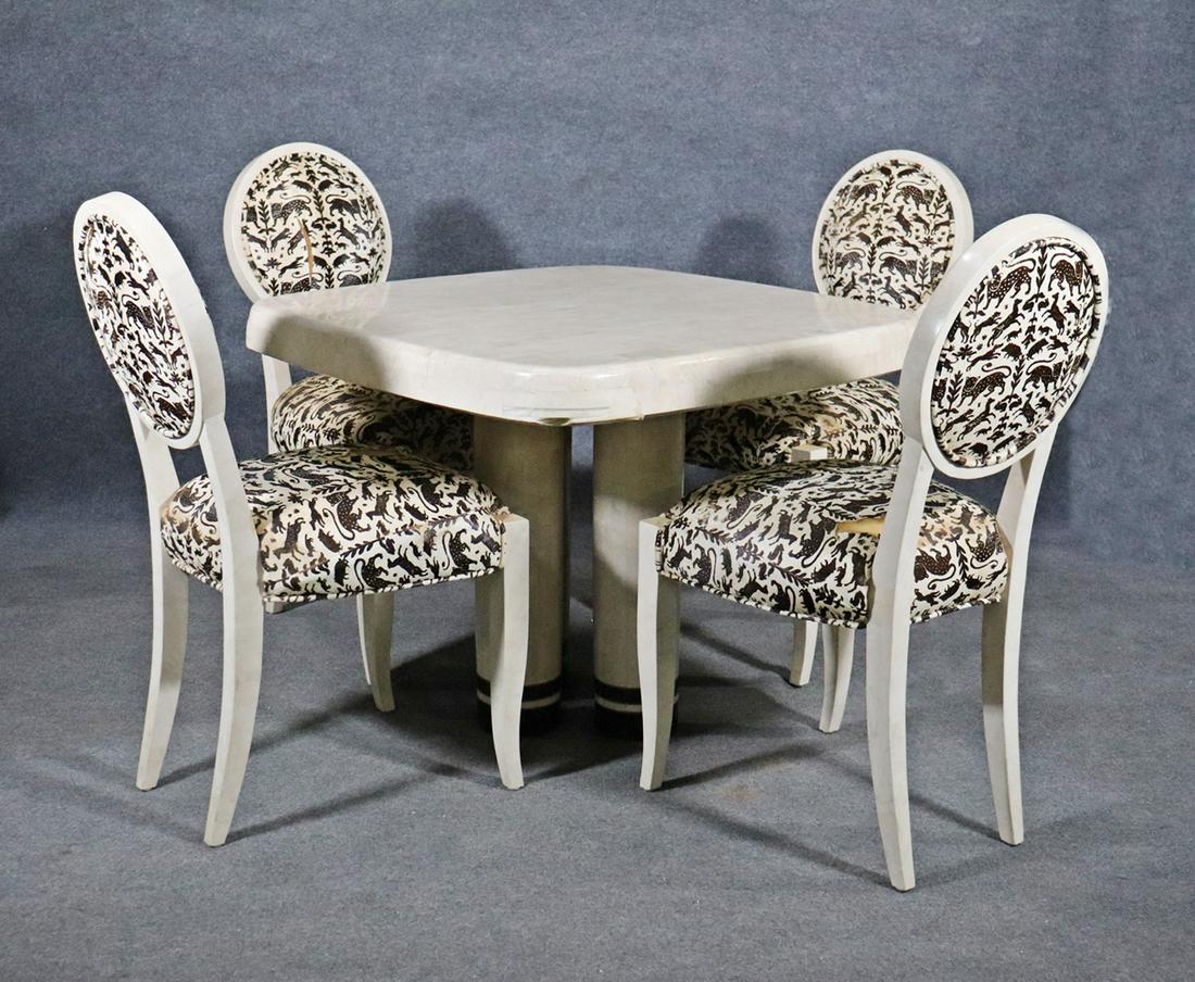 TESSELLATED DINING TABLE & 4 CHAIRS ATTR ENRIQUE GARCEL: Tessellated table measures 29" h x 34 1/2" square. Chairs have tessellated frame and legs. Cowhide seat and back. Chairs measures 27 3/4" h x 18" w x 21" d. Seat height 20".