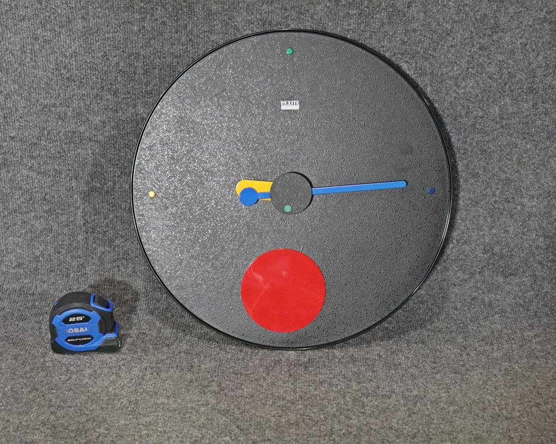 ITALIAN REXITE WALL CLOCK: Italian. Rexite. Design by Raul Barbieri and Georgio Marianelli. 17 1/2" diameter x 1 7/8" d.