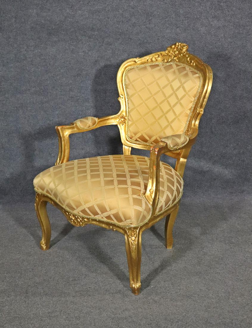 LOUIS XV STYLE GILT FAUTEUIL: Louis xv style. Gilt. Upholstered seat and back. 38 1/2" h x 26 5/8" w x 25 1/4" d. Seat height 17 1/2".