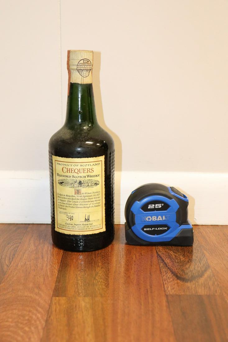 CHEQUERS BLENDED SCOTCH WHISKY: Chequers. John McEwan & CO. Scotland. 4/5th quart. Number 390. Sealed.