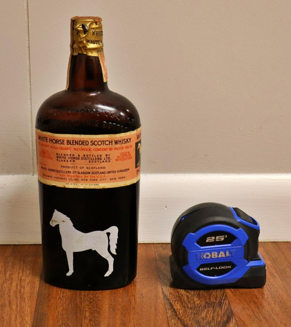 WHITE HORSE BLENDED SCOTCH WHISKY: White Horse Distillers. Glasgow, Scotland. Content 4/5th quart. Sealed.