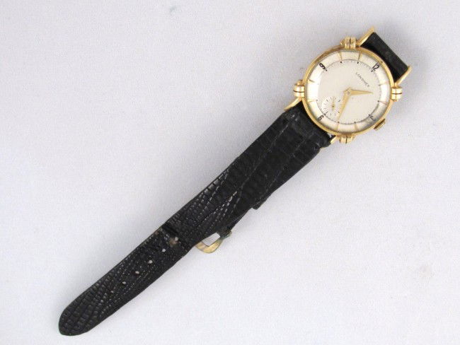 LONGINES 14k GOLD MEN'S WRIST WATCH: 17 jewel. Good condition. Presently working.