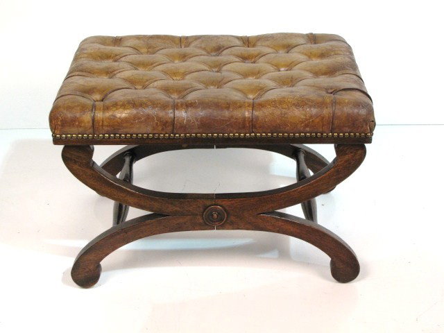 ENGLISH TUFTED LEATHER TABOURET STOOL: Chelsea Workshops, London. Worn leather. Missing rosette. Crack on frame. Fair condition. 17"h. x 25"w. x 18"d.