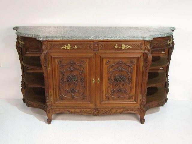 FRENCH CARVED WALNUT MARBLETOP CREDENZA: Finely carved. Very good condition. 41"h. x 79"w. x 24 1/2" d.