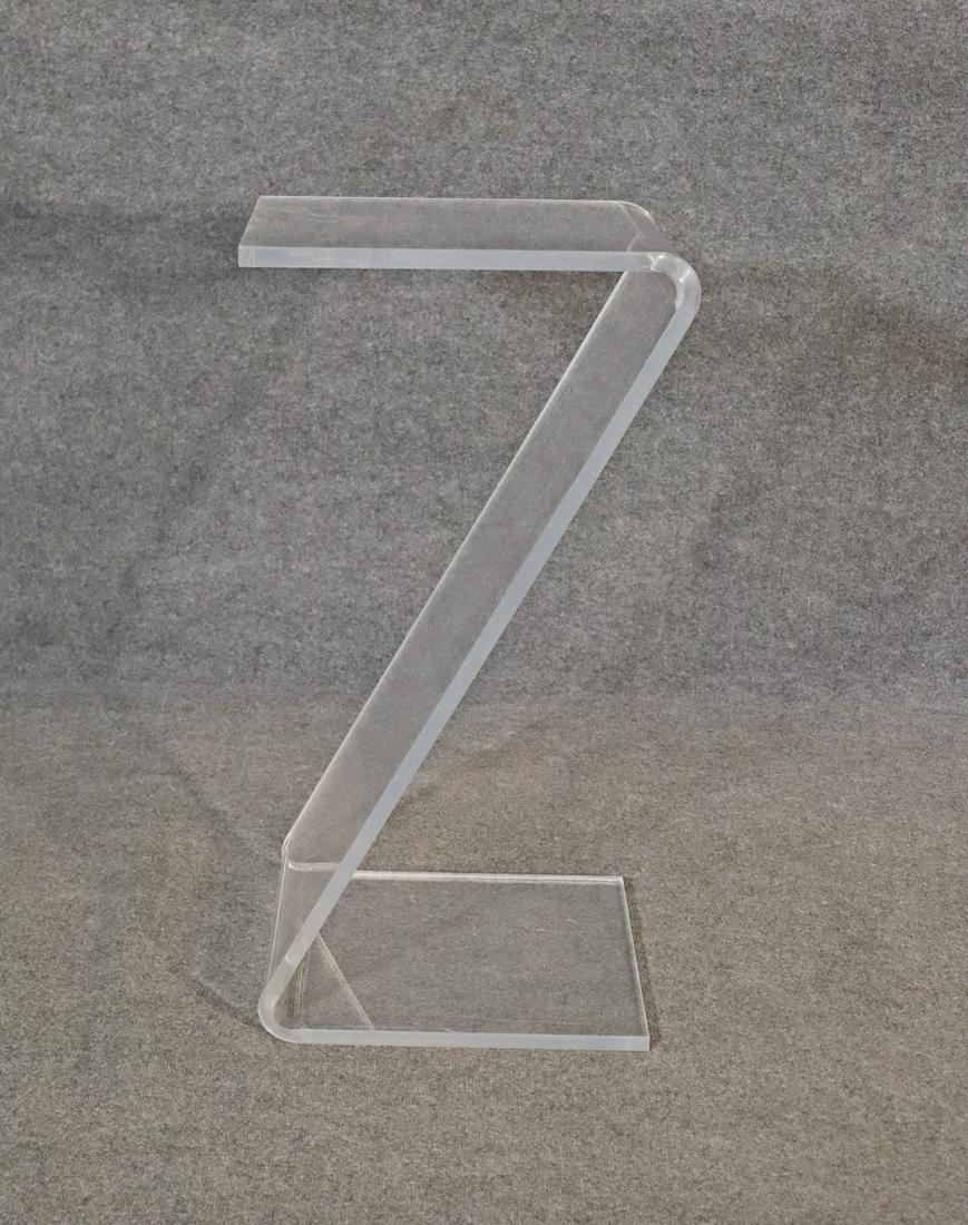 LUCITE Z FORM STAND: Lucite. 32 5/8" h x 14 7/8" w x 17 1/8" d.