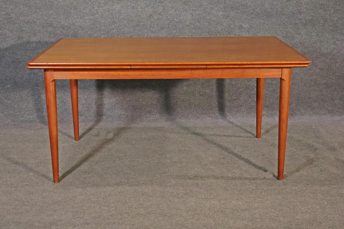 MOREDDI TEAK REFACTORY DINING TABLE: Moreddi. Danish. Teak. 28 1/8" h x 59 3/4" w x 37 1/4" d.