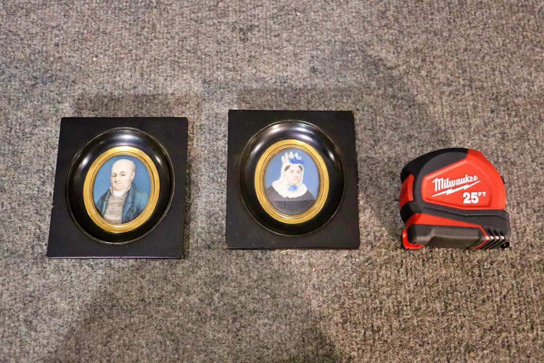 PAIR MINIATURE PORTRAITS: One man. One woman. Frame measures 4 3/4" h x 4 1/8" w x 1/2" d. Picture measures 2 7/8" h x 2 3/8" w.