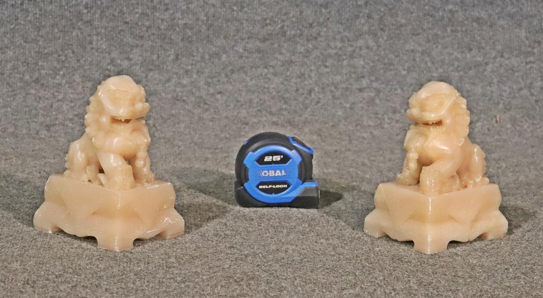 PAIR CARVED ALABASTER FOO DOGS: Carved. Alabaster. 6 3/4" h x 3 7/8" w x 4 3/4" d.