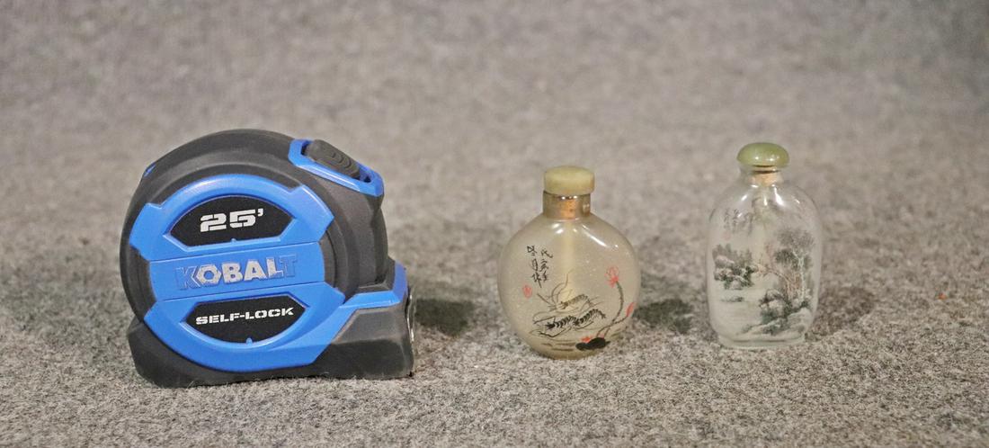 COMPANION PAIR ASIAN SNUFF BOTTLES: One measures 2 5/8" h x 1 7/8" w x 3/4" d. One measures 2 3/4" h x 1 1/2" w x 3/4" d.